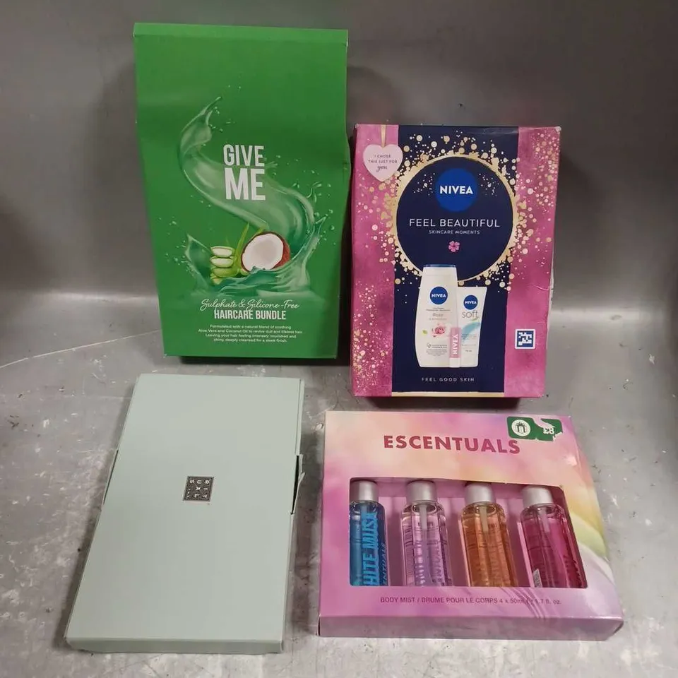 LOT OF 4 ASSORTED COSMETIC BOXSETS TO INCLUDE - GIVE ME HAIR CARE BUNDLE - ESCENTUALS BODY MIST SET - NIVEA FEEL BEAUTIFUL SKINCARE TRIO - ETC