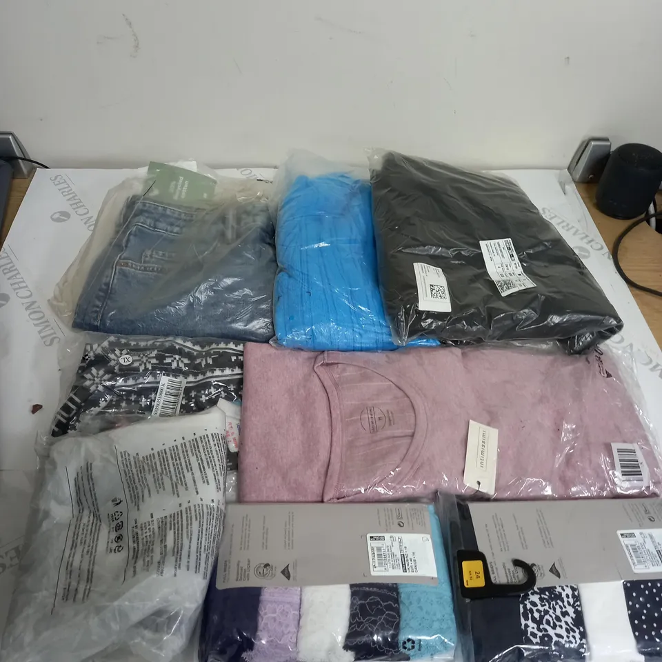LARGE BOX OF ASSORTED CLOTHING ITEMS IN VARIOUS COLOURS AND SIZES INCLUDING TROUSERS , TOPS AND JUMPERS 