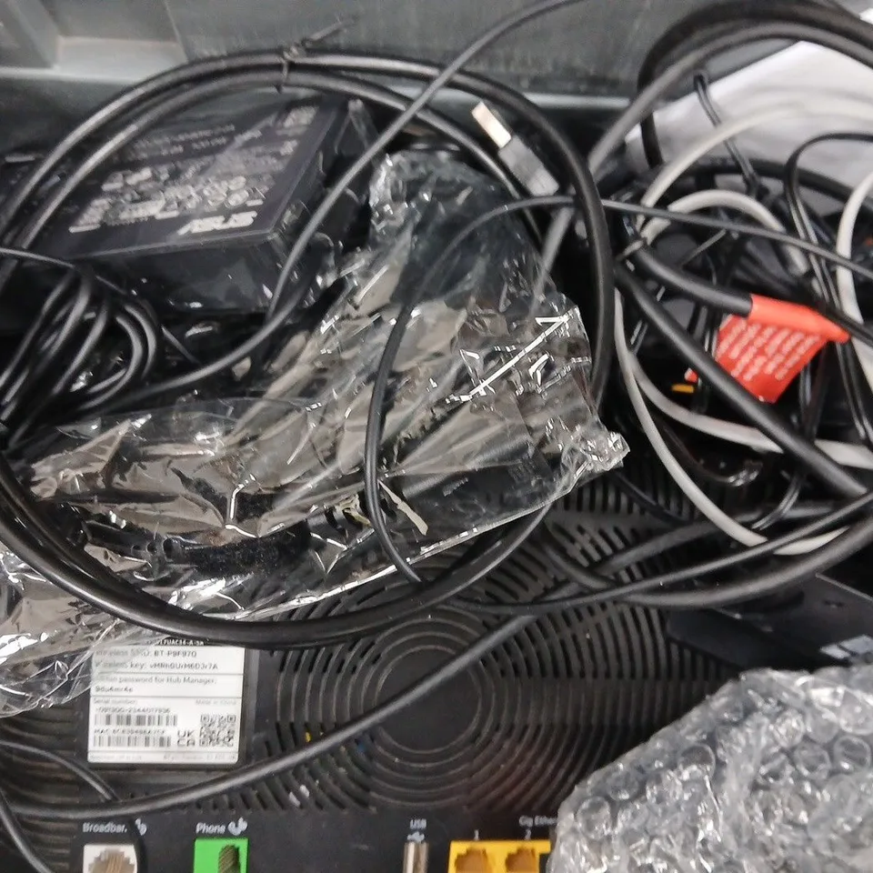 APPROXIMATELY 8 ASSORTED HOUSEHOLD ITEMS TO INCLUDE VARIOUS REMOTES AND CABLES, ETC