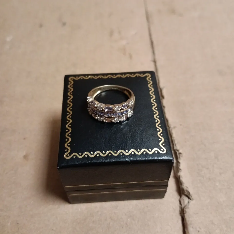 RING WITH CLEAR AND BLUE STONES IN A SILVER-TONE SETTING – BOXED 