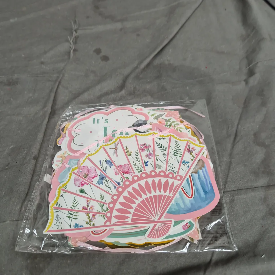 TOTE OF APPROXIMATELY 20 PACKS OF CELEBRATION DECORATIONS