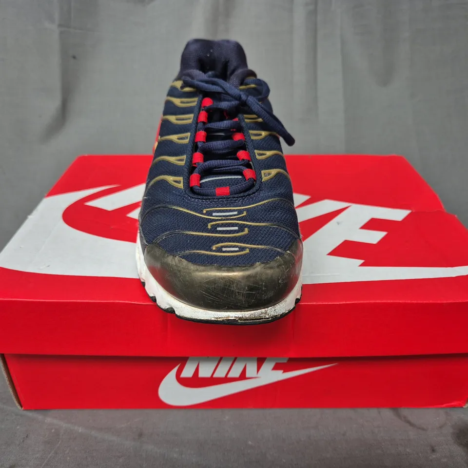 BOXED PAIR OF NIKE AIR TN SHOES IN NAVY/GOLD/RED UK SIZE 9.5