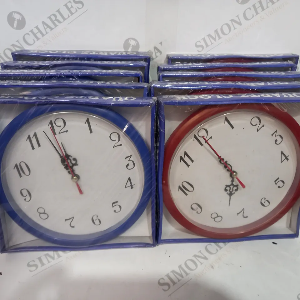BOX OF APPROX 10 SMALL BLUE AND RED QUARTZ CLOCKS