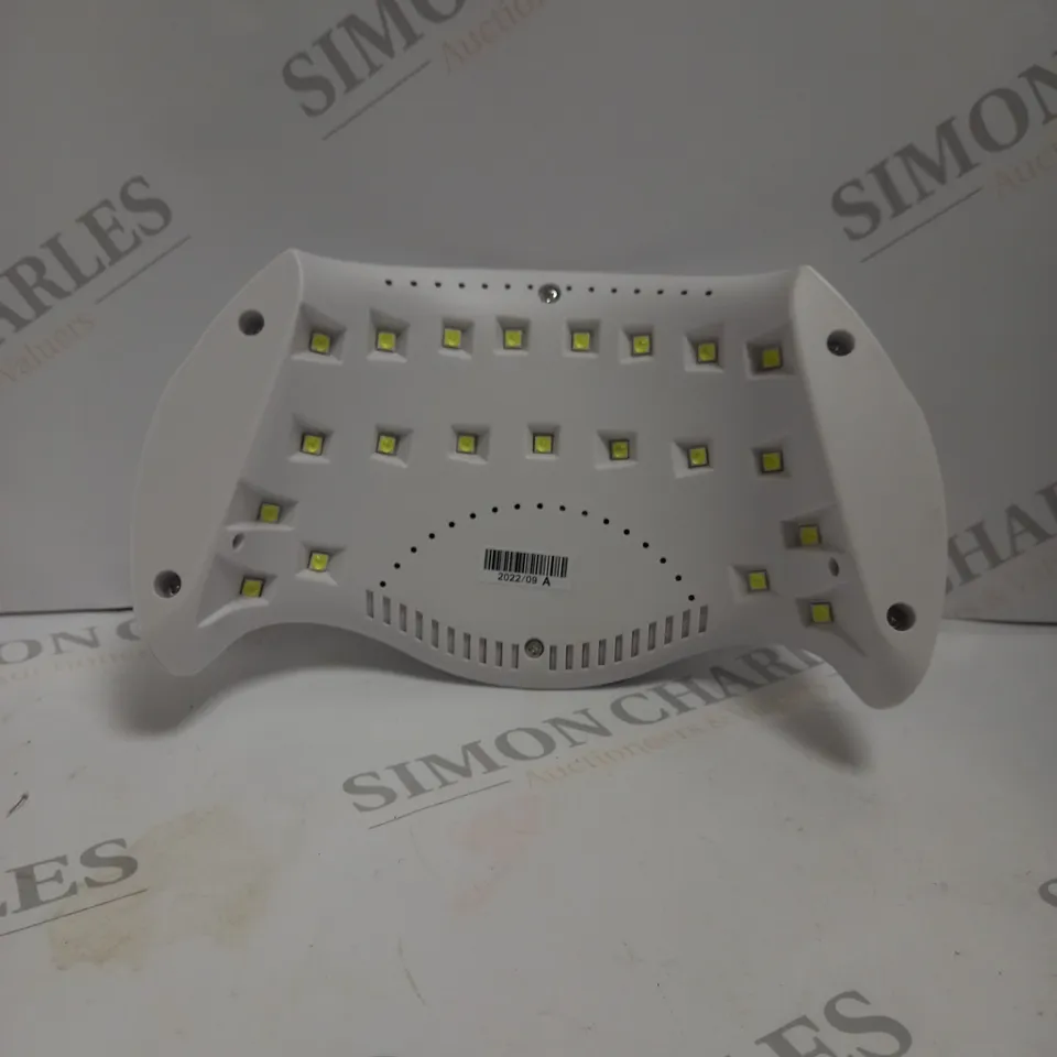 BOXED PROFESSIONAL GEL POLISH UV LED NAIL DRYER LAMP.