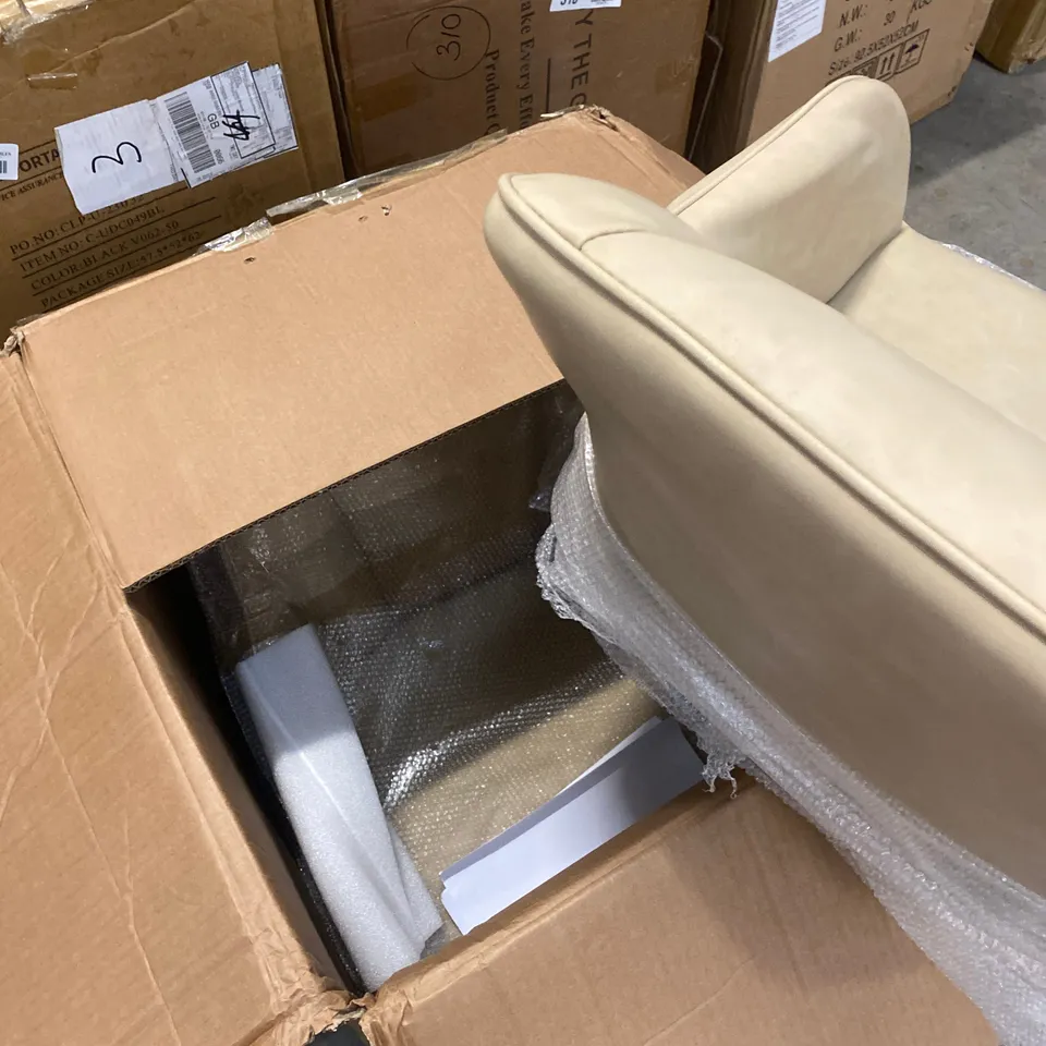 A BOXED PAIR OF CREAM FAUX LEATHER UPHOLSTERED DINING/SIDE CHAIRS