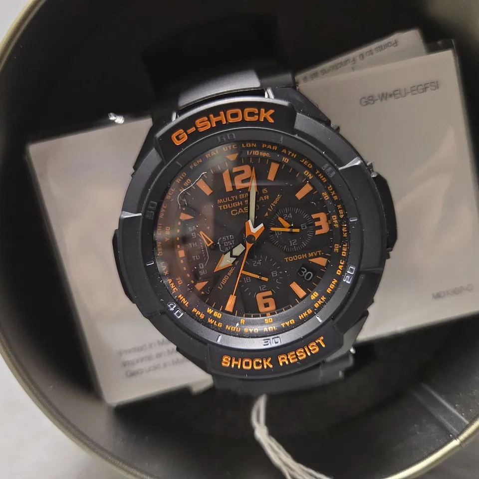 BOXED CASIO G SHOCK MULTI BAND IN BLACK & ORANGE 
