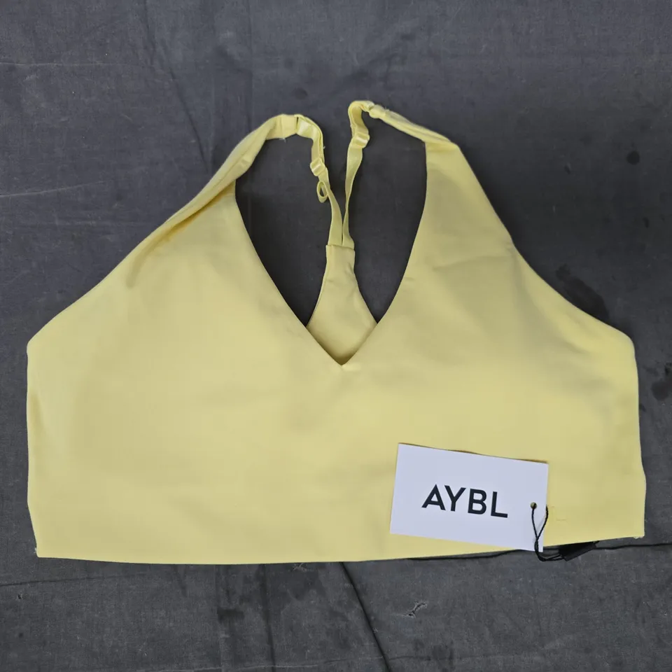 AYBL STAPLE SPORTS BRA IN PASTEL LEMON SIZE MEDIUM