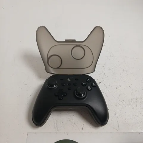 GAME CONTROLLER WITH TRANSLUCENT PROTECTIVE SHELL