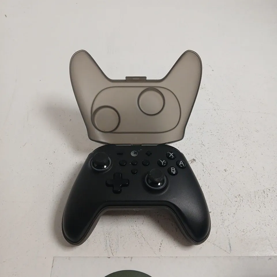 GAME CONTROLLER WITH TRANSLUCENT PROTECTIVE SHELL
