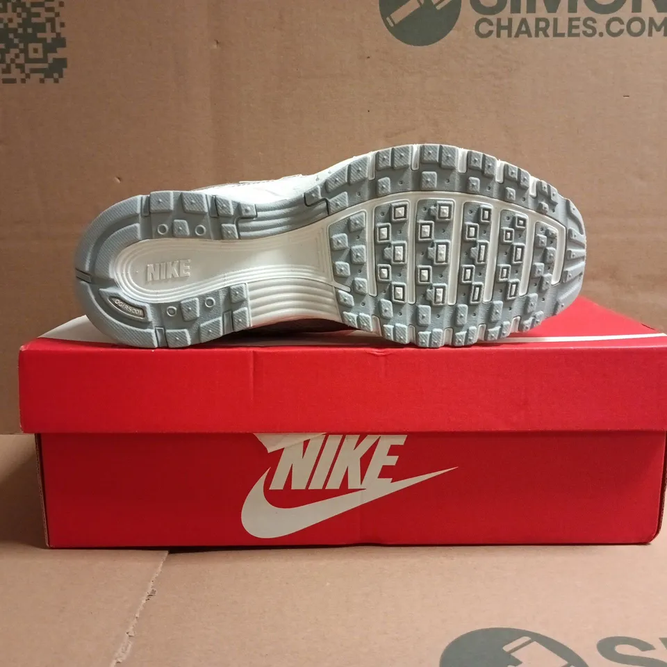 BOXED PAIR OF NIKE P-6000 TRAINERS IN WHITE SIZE UK 4