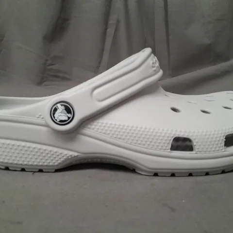 PAIR OF CROCS CLASSICS IN GREY UK SIZE M5/W6