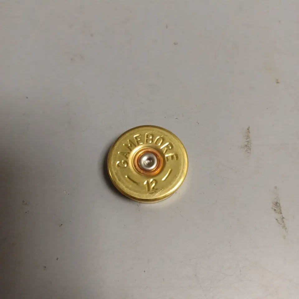 LARGE QUANTITY OF SHOTGUN SHELL HEADS STAMPED GAMEBORE 12