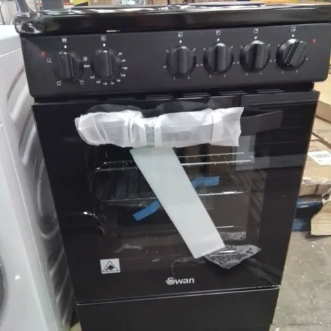 BOXED SWAN SX16710B 50CM WIDE ELECTRIC SOLID BLACK COOKER -