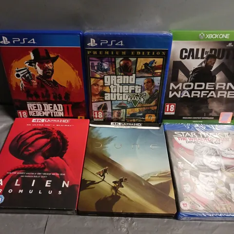 APPROXIMATELY 18 ASSORTED DVDS AND GAMES TO INCLUDE GRAND THEFT AUTO V (PS4), ALIEN ROMULUS (BLU-RAY), CALL OF DUTY MODERN WARFARE (XBOX ONE), ETC