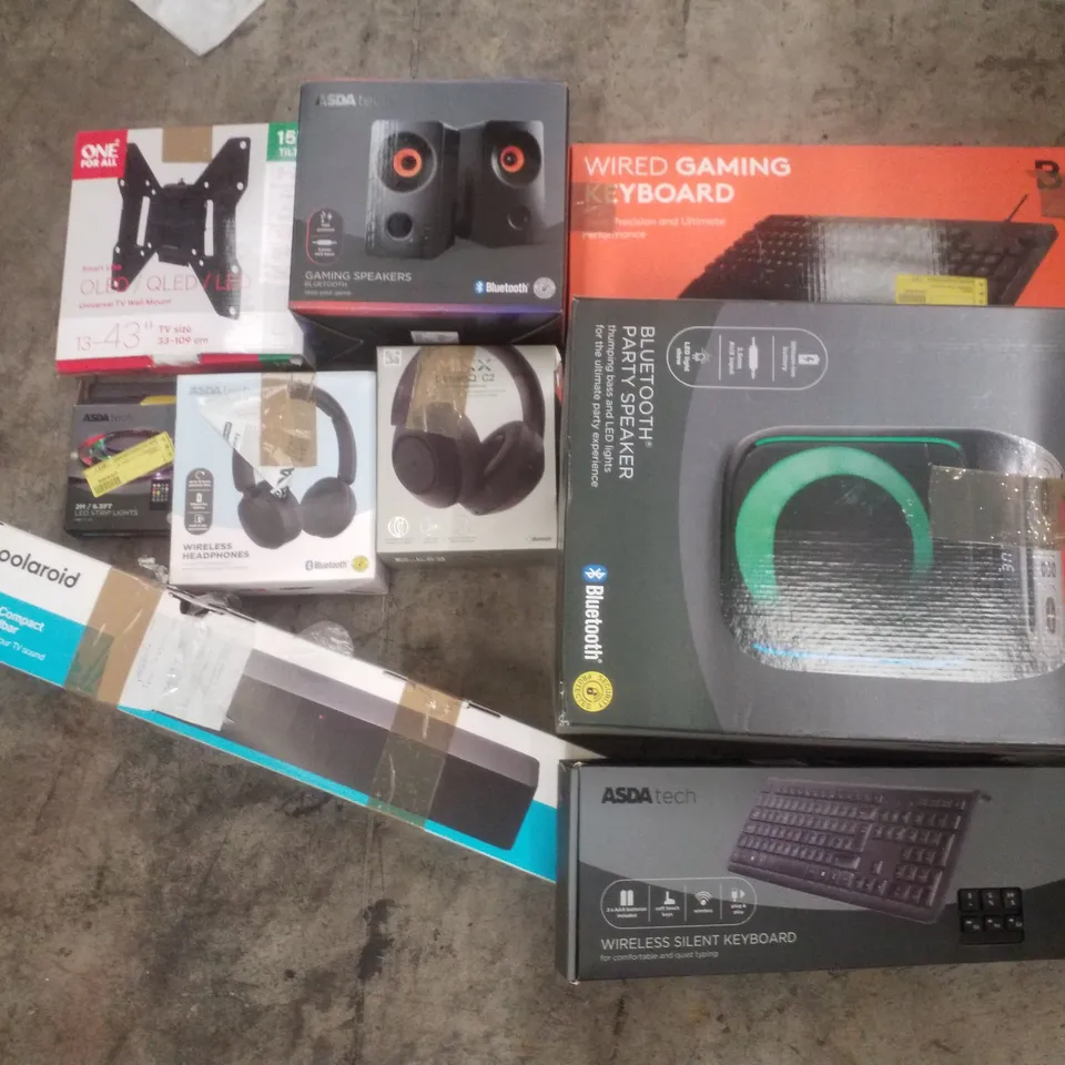 PALLET CONTAINING ASSORTED ELECTRICAL RETURNS INCLUDING BLUETOOTH PARTY SPEAKER, KEYBOARDS, HEADPHONES, 25W POLAROID COMPACT SOUNDBAR & UNIVERSAL TV WALL MOUNT