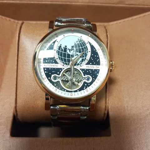MEN’S HELMA DH AUTOMATIC WORLD VIEW WATCH – TOURBILLON MOVEMENT – BLUE DIAL – STAINLESS STEEL STRAP – GLASS EXHIBITION BACK CASE – LEATHER STRAP INCLUDED –