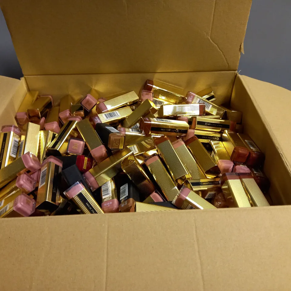 BOX OF ASSORTED MAX FACTOR LIPSTICKS. ASSORTED COLOURS