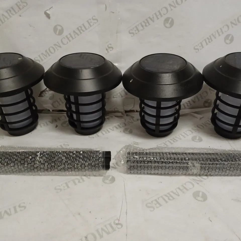 BELL & HOWELL SET OF 4 SOLAR 21 LUMENS DUAL FUNCTION FLAME/ WHITE STAKE LIGHTS