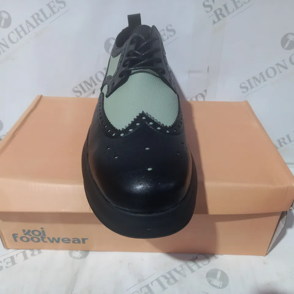 BRAND NEW BOXED PAIR OF KOI VEGAN LEATHER CORSON GREEN BROGUE DETAIL TRAINERS IN BLACK UK SIZE 8