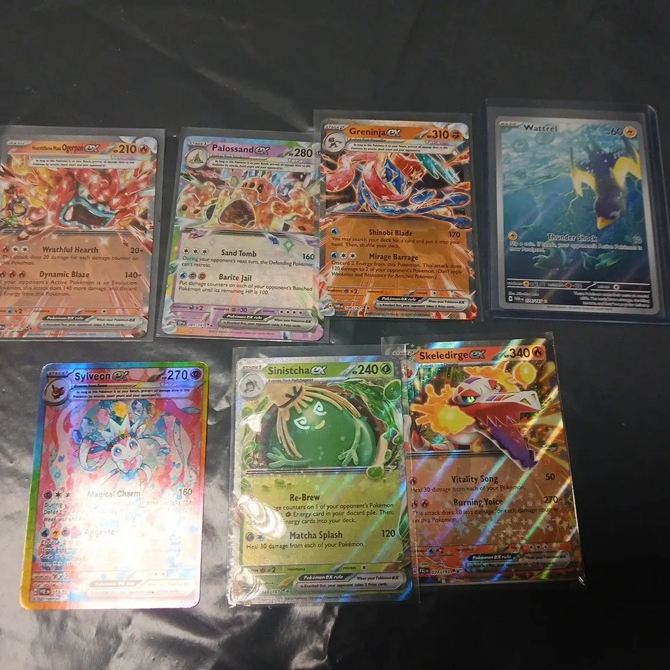 MIXED LOT OF APPROXIMATELY 24 RARER POKÉMON TRADING CARDS