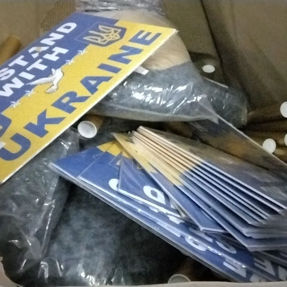 PALLET OF ASSORTED ITEMS INCLUDING WE STAND WITH UKRAINE LAWN SIGN, PET BED, A1 WORLD MAP POSTER