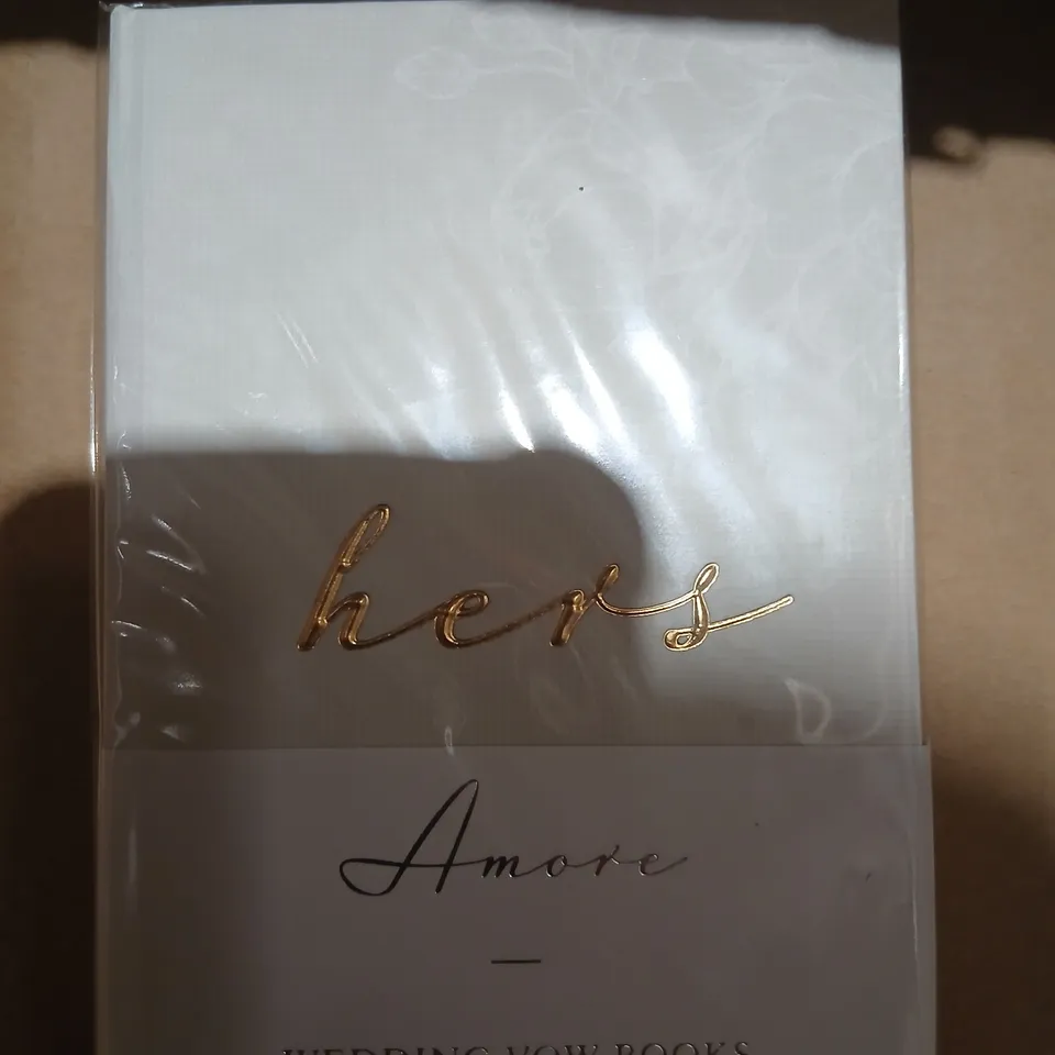 APPROXIMATELY 48 AMORE WEDDING VOW BOOKS