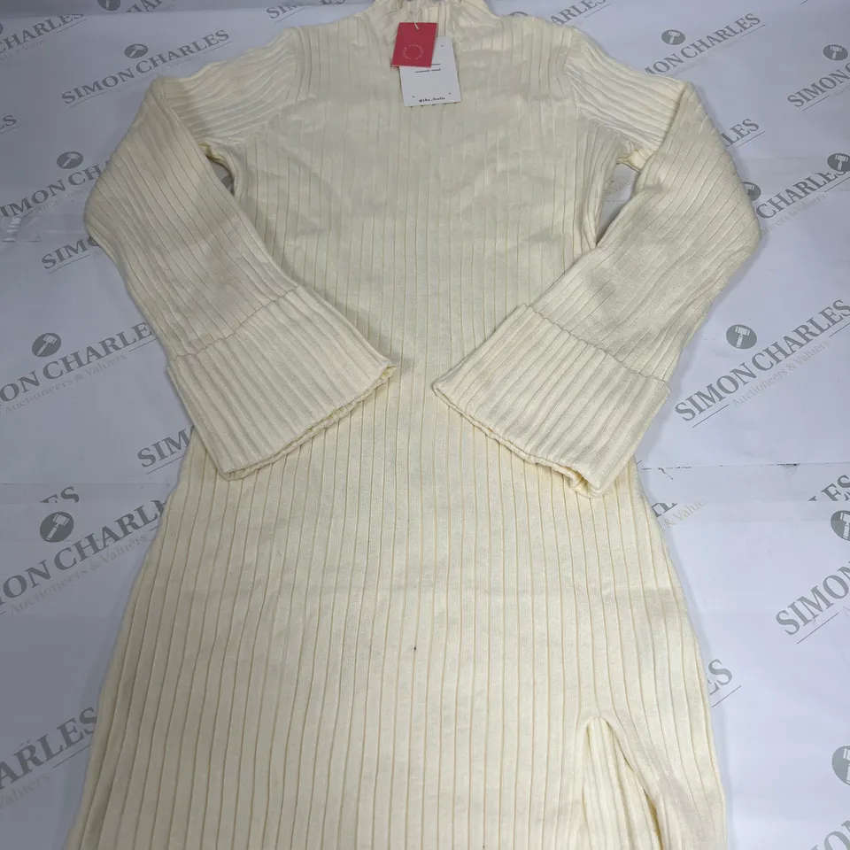 THE FROLIC STRETCH FIT FUNNEL JUMPER IN OFF WHITE SIZE 10