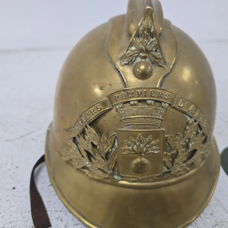 ANTIQUE BRASS MINIATURE FIREFIGHTER HELMET WITH POMPIERS CREST,