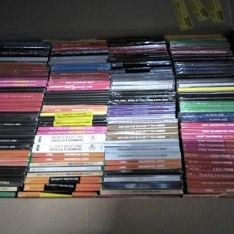 APPROXIMATELY 100 ASSORTED CDS AND DVDS TO INCLUDE NOW MUSIC 18, NOW YEARBOOK, AND NOW THAT'S WHAT I CALL ETC.