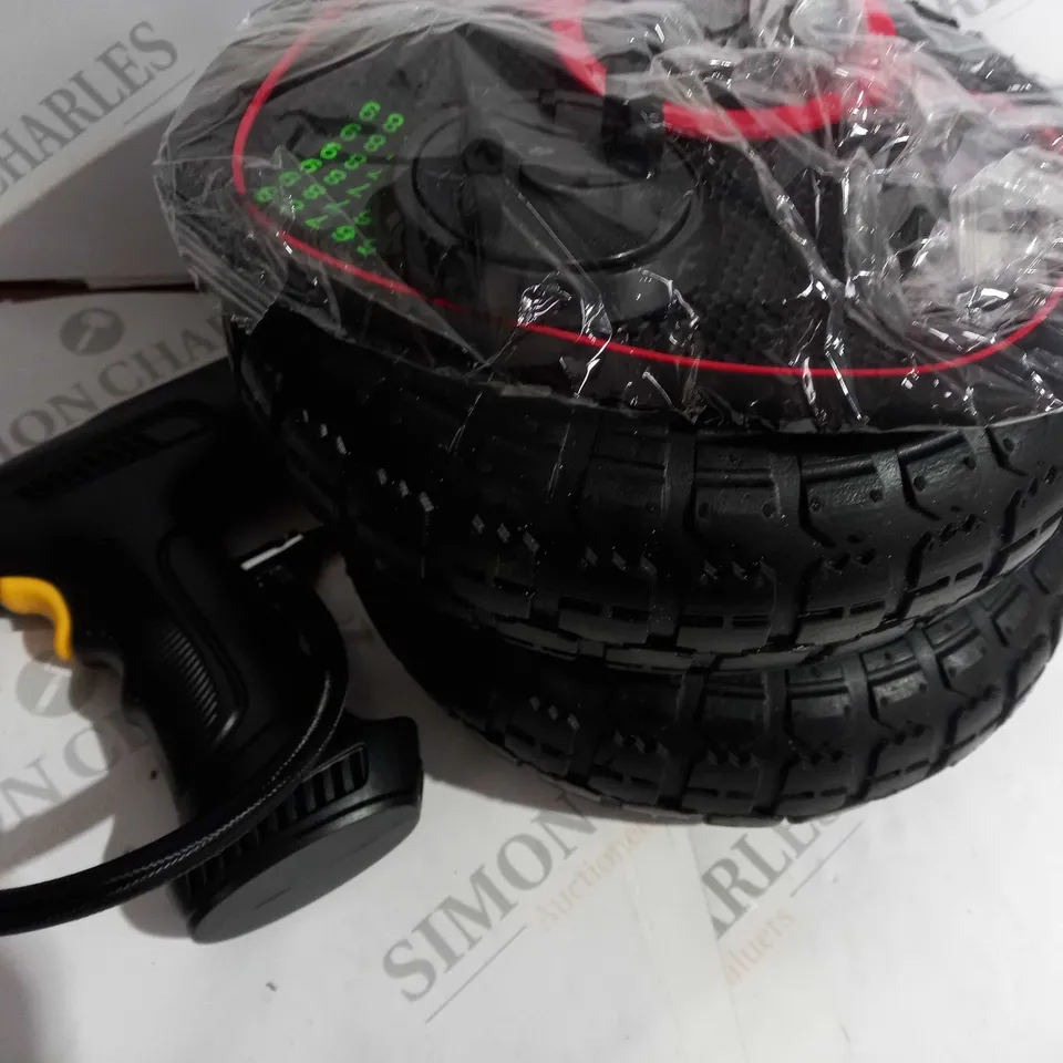 lot of assorted car items to include small wheels - dashboard matt - air pump 