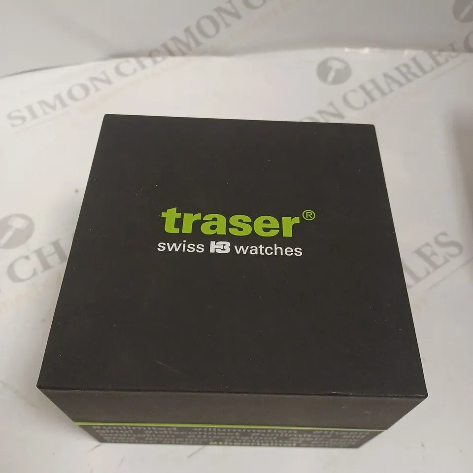 BOXED TRASER WATCH WITH YELLOW SILICONE STRAP AND CHANGEABLE SILVER LINK STRAP, AND TRASER MINI TORCH 