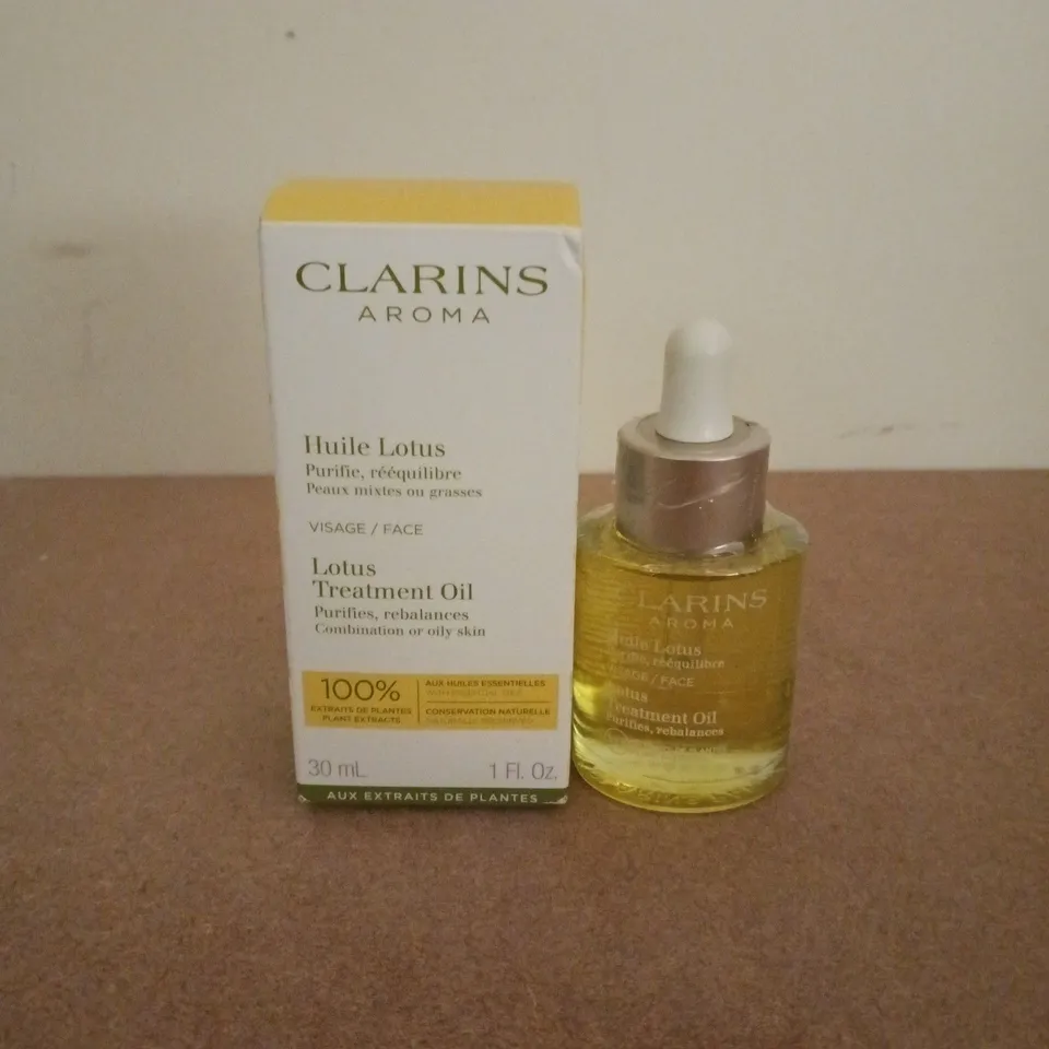 BOXED CLARINS AROMA LOTUS TREATMENT OIL (30ML)