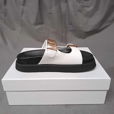 BOXED PAIR OF MOSCHINO SLIDERS SIZE EU 36