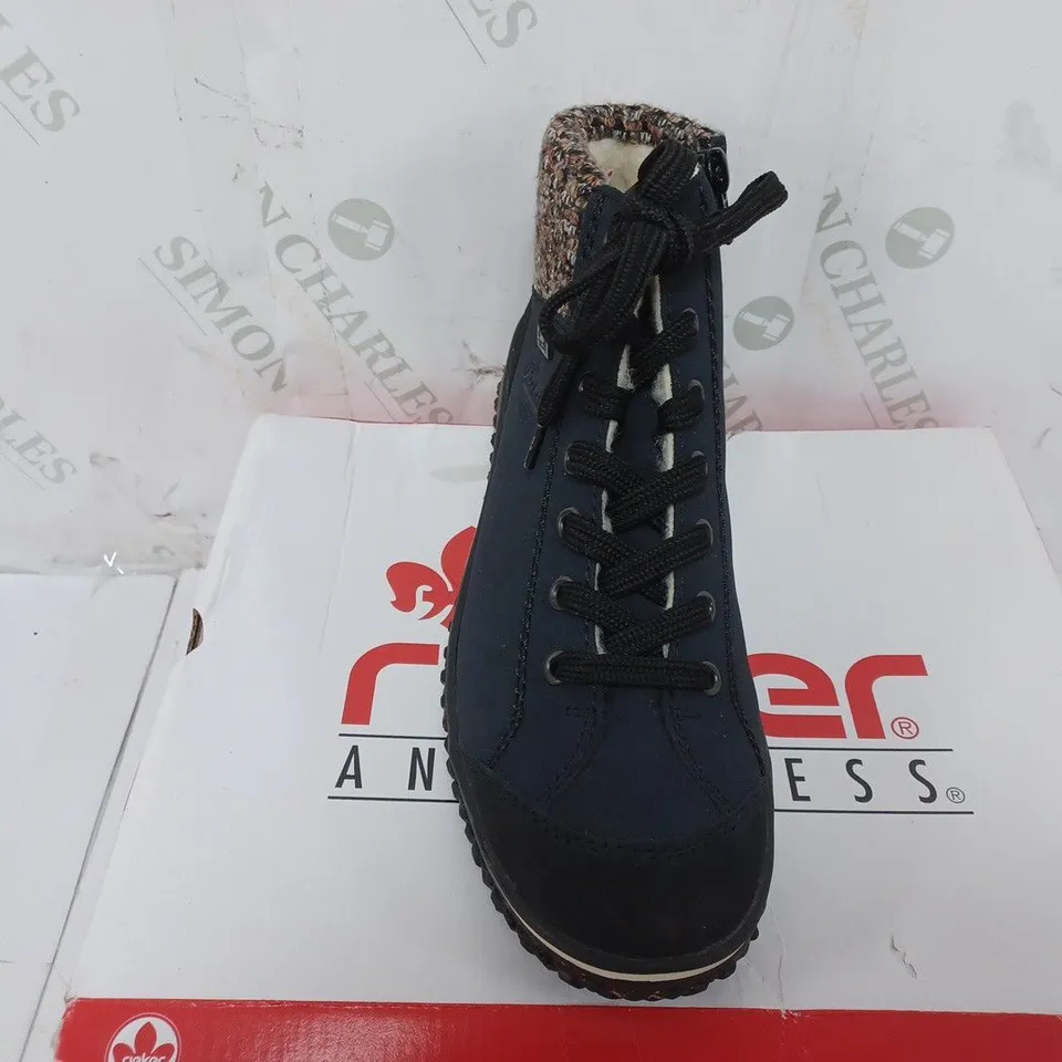 BOXED PAIR OF RIEKER LACE UP WATER RESISTANT BOOTS IN NAVY SIZE 5