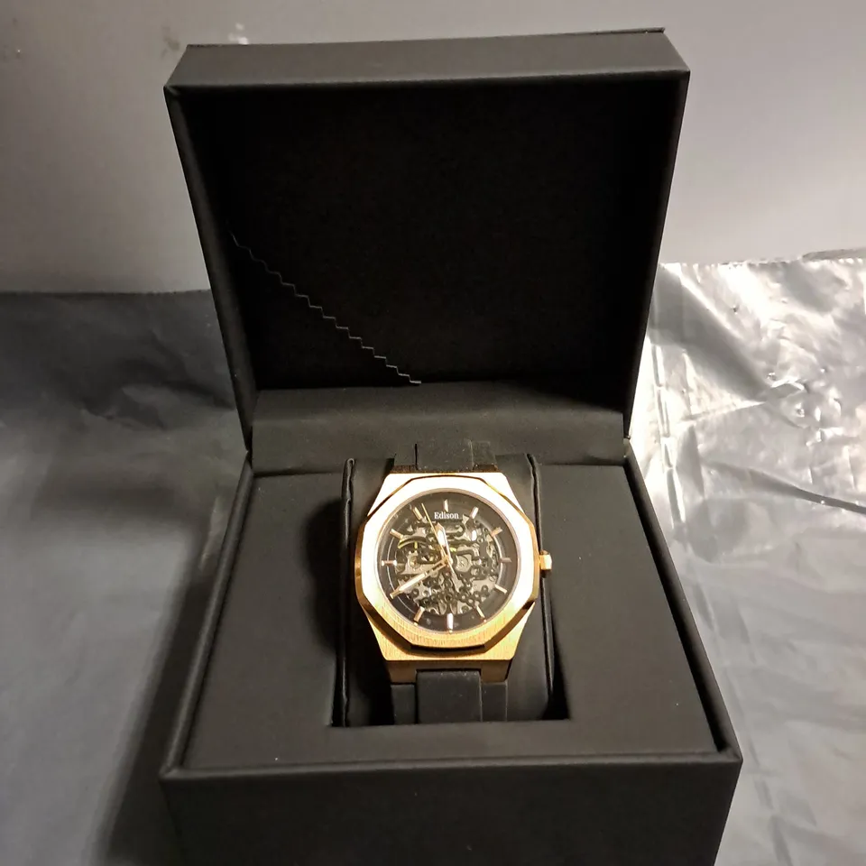 BOXED EDISON AUTOMATIC ROSE GOLD WATCH WITH BLACK DIAL IN HEXAGON CASE