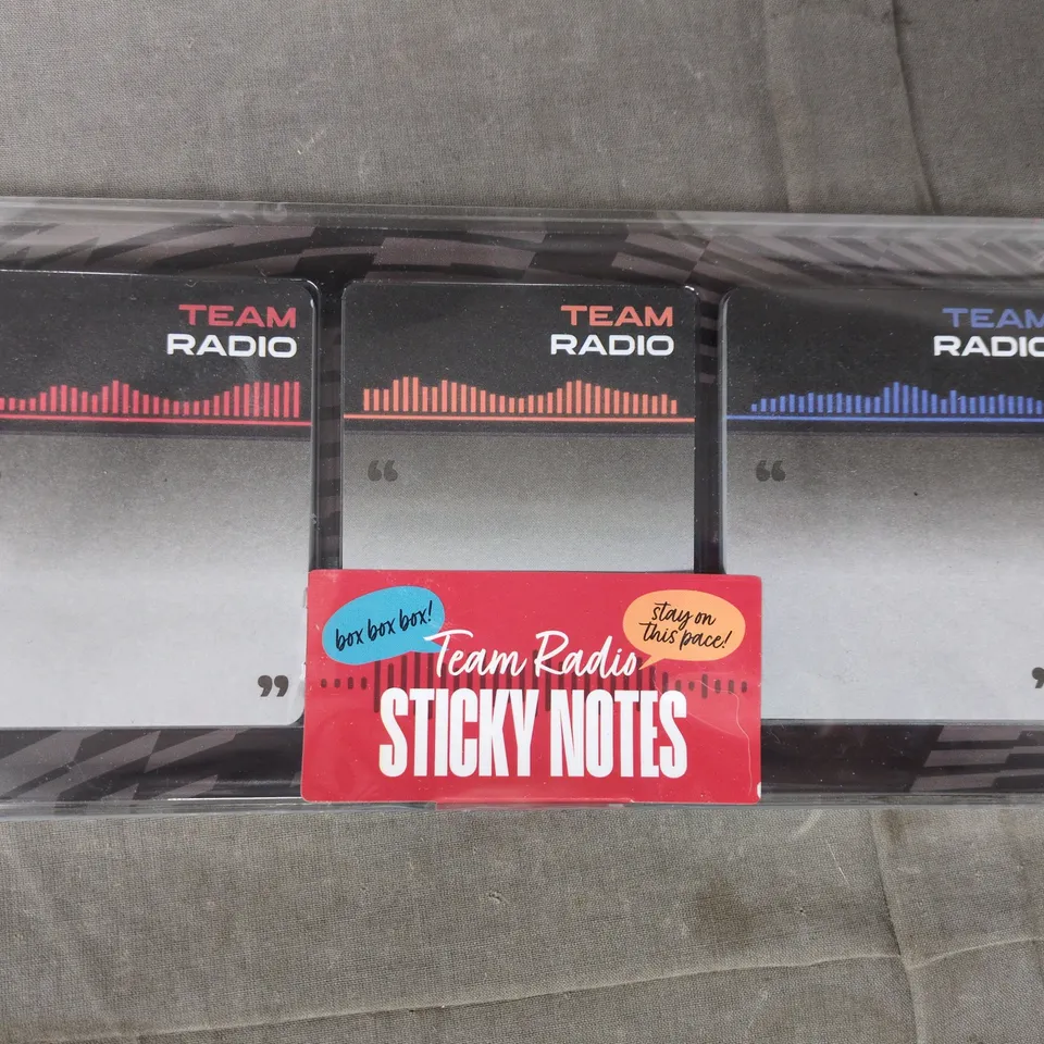 APPROXIMATELY 5 ASSORTED HOUSEHOLD ITEMS TO INCLUDE TEAM RADIO STICKY NOTES, BLOOD PRESSURE MONITOR, ETC