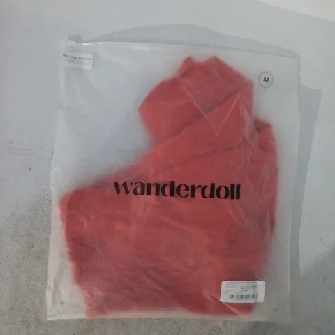 BAGGED WANDERDOLL ELIZA KNITTED MAXI SKIRT WITH SWIRL DETAIL IN TANGERINE SIZE MEDIUM