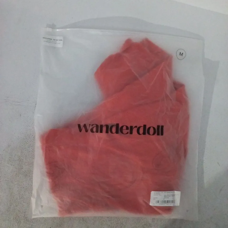 BAGGED WANDERDOLL ELIZA KNITTED MAXI SKIRT WITH SWIRL DETAIL IN TANGERINE SIZE MEDIUM
