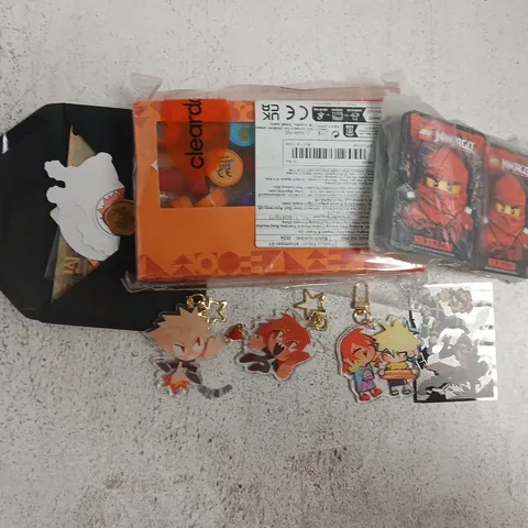 APPROXIMATELY 12 ASSORTED TOYS AND GAMES TO INCLUDE NINJAGO CARDS, ETC
