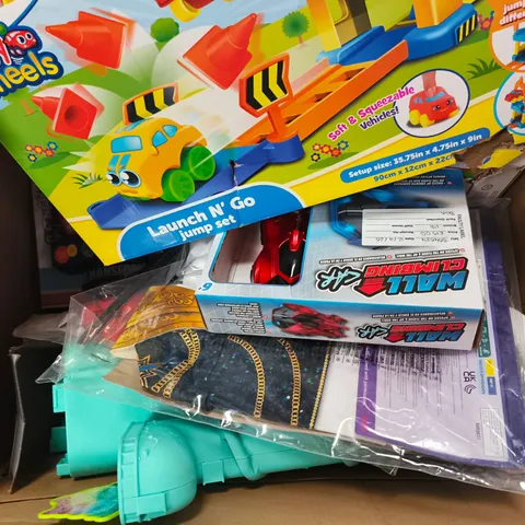 APPROXIMATELY 6 ASSORTED TOYS & GAMES PRODUCTS TO INCLUDE BABY WHEELERS, LAUNCH N' GO JUMP SET, WALL CLIMBING CAR, TRANSFORMERS BUMBLEBEE FIGURE, ETC - COLLECTION ONLY