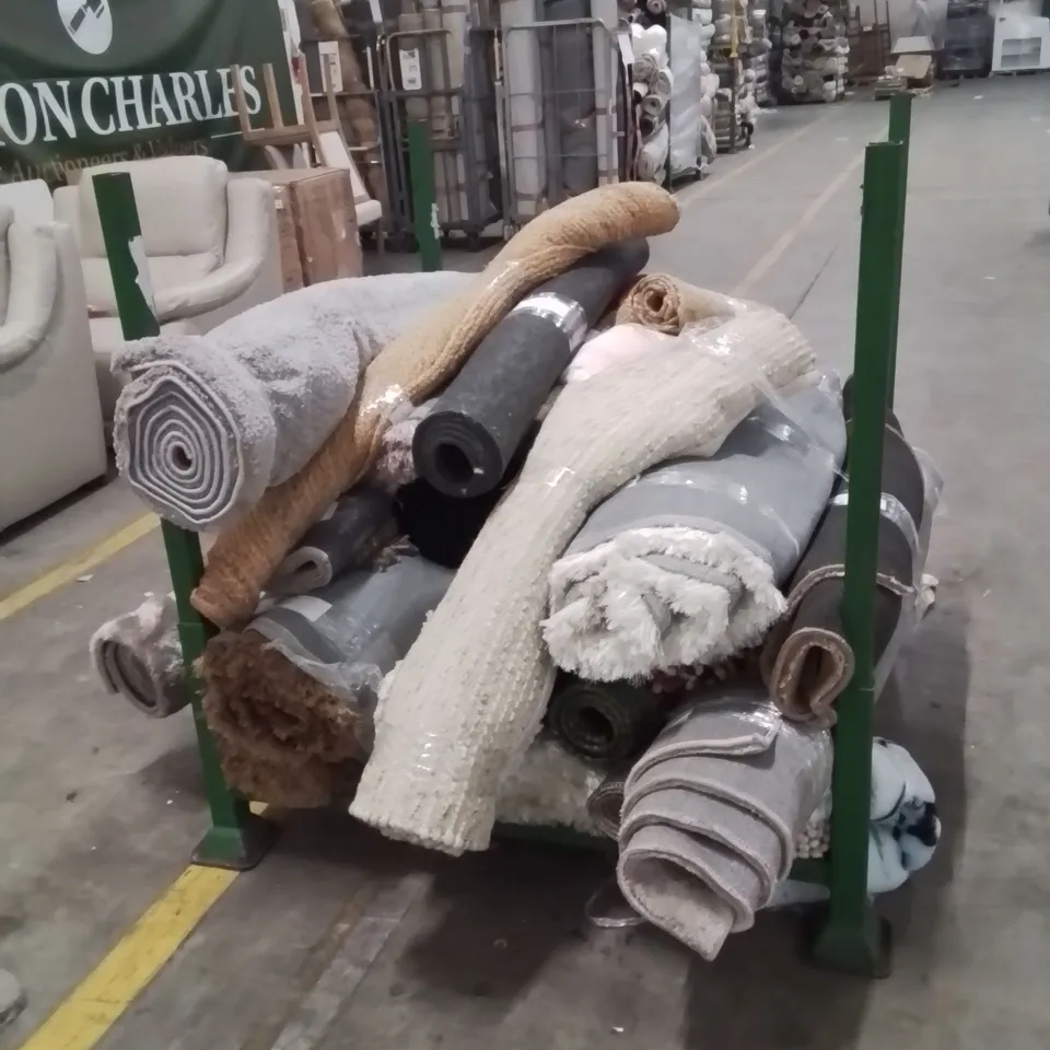 STILLAGE OF APPROXIMATELY 15 QUALITY DESIGNER RUGS