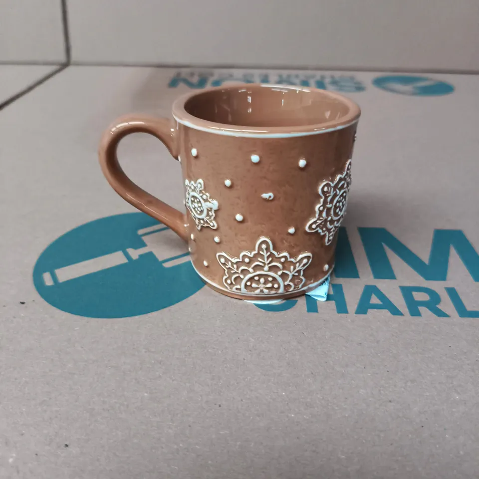 APPROXIMATELY 40 GISELA GRAHAM CERAMIC GINGERBREAD MUGS