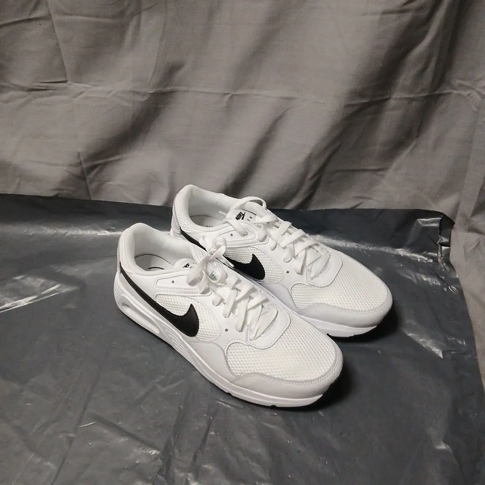 NIKE WHITE RUNNING SHOES WITH BLACK SWOOSH UK SIZE 9. UNBOXED