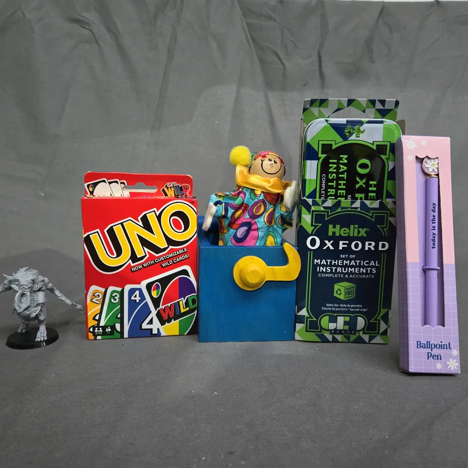 BOX OF APPROX 12 ASSORTED TOYS TO INCLUDE - UNO CARDS , HELIX MATHEMATICAL INSTRUMENTS , BALLPOINT PEN ETC 