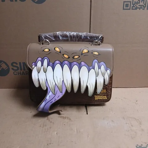 KOI DUNGEONS & DRAGONS BROWN HANDBAG WITH MONSTER-MOUTH TEETH DESIGN