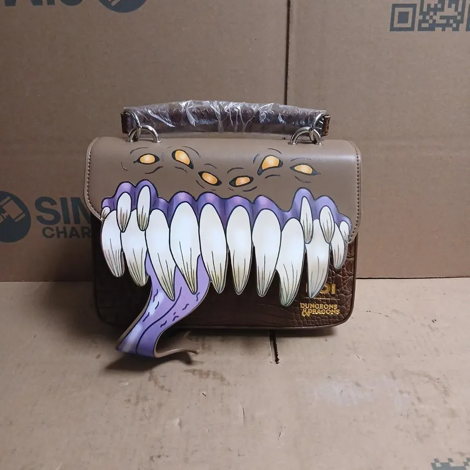 KOI DUNGEONS & DRAGONS BROWN HANDBAG WITH MONSTER-MOUTH TEETH DESIGN