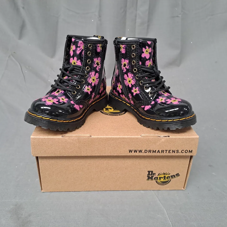 BOXED PAIR OF DR MARTENS KIDS 1460 T BOOTS IN BLACK W. PINK FLORAL PRINT UK SIZE 6