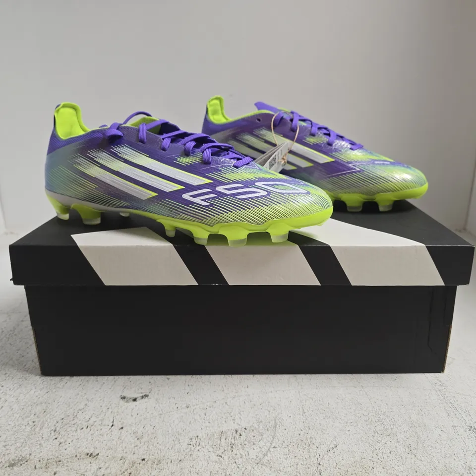 BOXED PAIR OF ADIDAS F50 PRO MG FOOTBALL BOOTS IN PURPLE/GREEN SIZE UK 9.5
