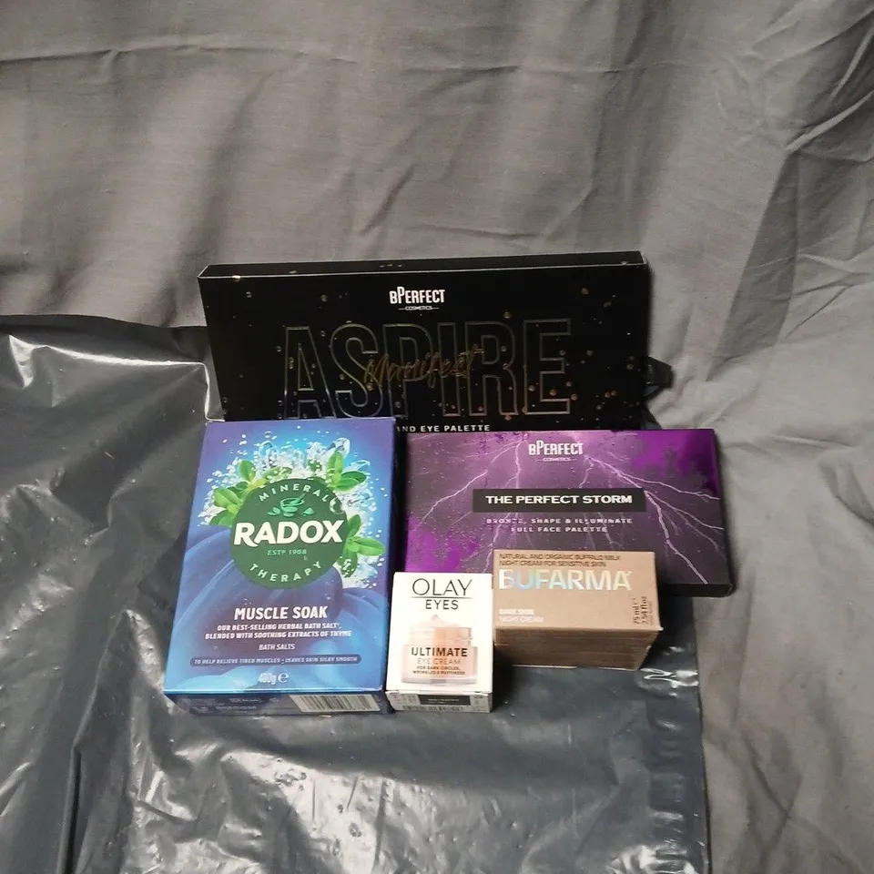 APPROXIMATELY 20 ASSORTED COSMETICS INCLUDING RADOX, OLAY EYE CREAM, BPERFECT FULL FACE PALETTE, EYE PALETTE ETC