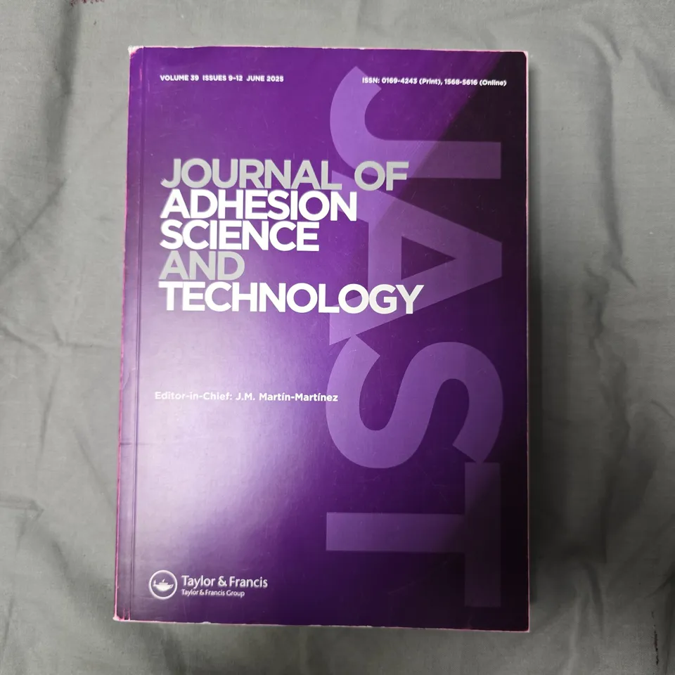 JOURNAL OF ADHESION AND TECHNOLOGY VOL 39